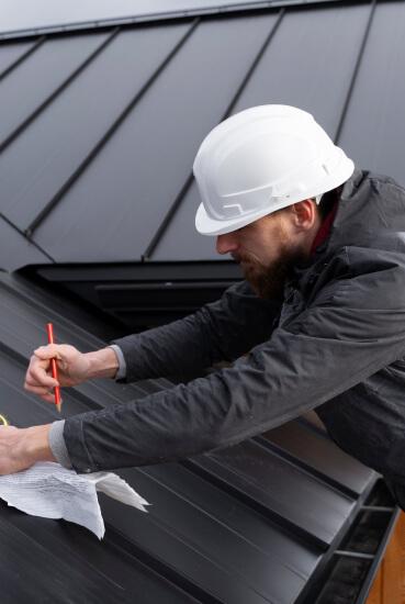 Roofing professional at work